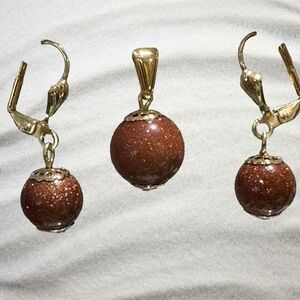 Elegant Goldstone Earrings and Pendant Set
